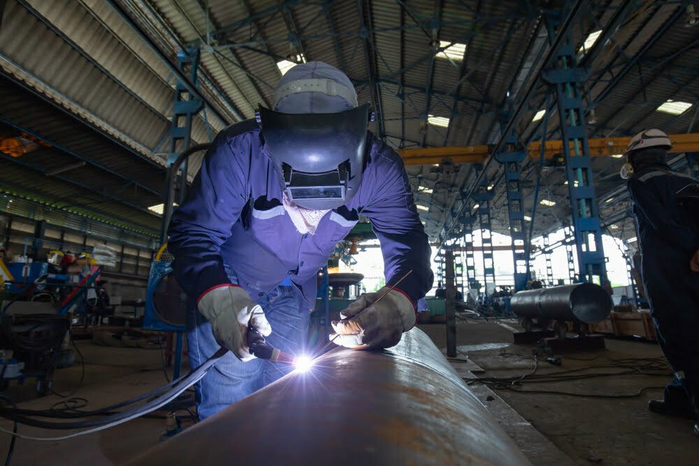 Welder doing carbon steel welding
